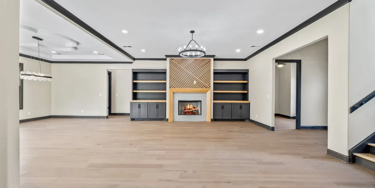 An open kitchen and living space in a finished home